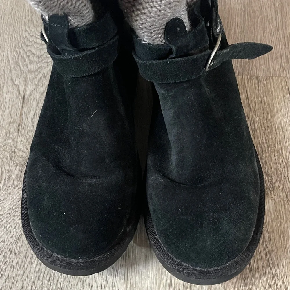 UGG Australia Nyla boots in black suede with a gray knit shaft and buckle strap